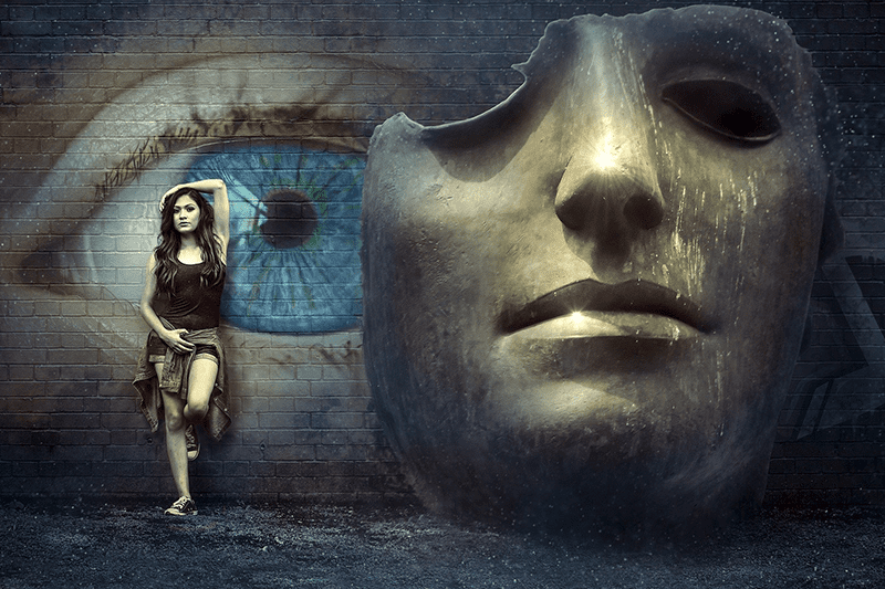 Woman leaning against wall - Anxiety Symptoms can present in women of all ages